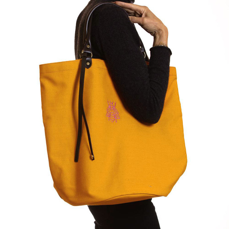 Seville orange with pink bee